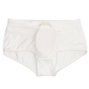 Detail view of white swim trunks featuring an adjustable drawstring and supportive oval pad