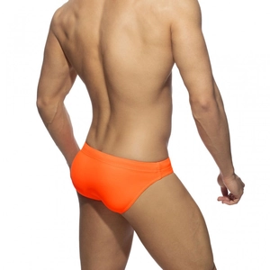 Rear view of men's neon orange tight swim briefs in high-quality quick-dry fabric