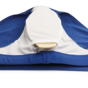 Detail of blue men's swim briefs featuring white mesh lining and a yellow protective cup insert