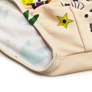 Detail view of high-elasticity fabric with leopard cat print and double-needle stitching