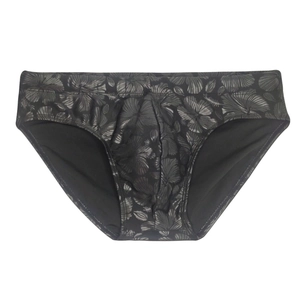 Macro detail of men's dark grey swim briefs with floral hibiscus pattern print