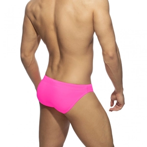 Vue arrière du slip de bain homme rose fluo avec taille élastique et coupe ajustée
