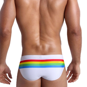 Men's low-rise swim briefs in white featuring vibrant rainbow striped back details