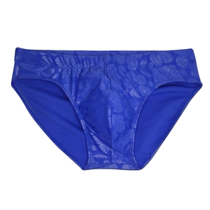 Close-up of royal blue men's swim briefs with tropical floral print and elastic waist