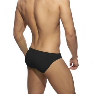 Vue arrière du slip de bain noir uni à taille basse pour homme en tissu extensible