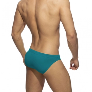 Rear view of men's quick-dry low-rise swim briefs in peacock blue with matte fabric finish