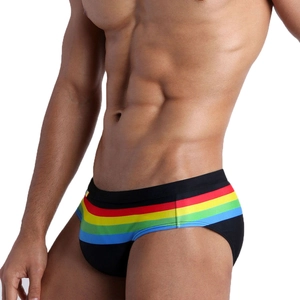 Men's low rise black swim briefs with rainbow stripes and ergonomic cup design