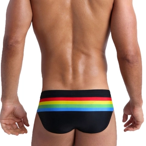 Rear view of men's quick-dry rainbow striped swim briefs showing fit and back cut