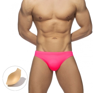 Detail of neon pink men's swim briefs with removable contour sponge padding insert