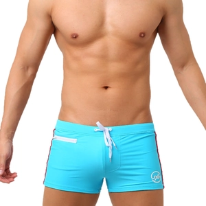 Men's light blue square cut swimsuit with red side stripes and functional zipper pocket