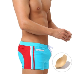Sky blue men's swim trunks with red white side stripes and protective cup insert
