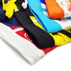 Close-up of multicolored men's stretch swim trunks with drawstrings and neat stitching
