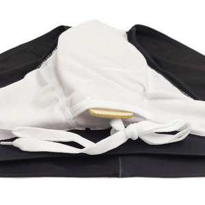 Detail view of men's swim briefs with white drawstring tie and U-convex pouch lining