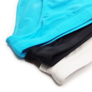 Detail showing high-elastic solid color swim briefs with reinforced flat-lock stitching
