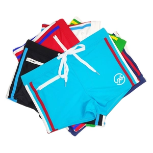 Detail of men's quick-dry swim trunks with drawstring waist and zipper pocket in 5 colors