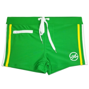 Detail of men's swim trunks with drawstring waist, side zipper pocket and stripe accents