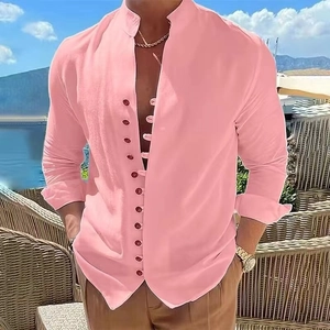 Detailed close-up of pink linen men's shirt with mandarin collar and red button accents