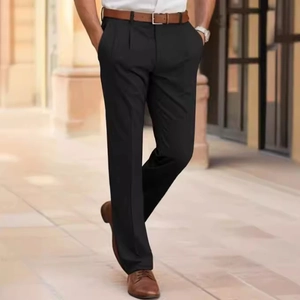 Men's formal black straight-leg trousers styled with leather belt and shoes in outdoor setting