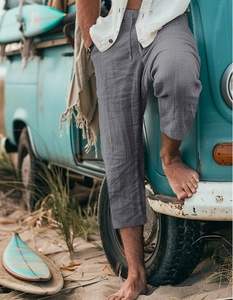 Detail of grey men's casual drawstring shorts featuring breathable natural fiber texture
