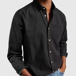Classic men's black linen shirt with long sleeves and front pocket for summer beach