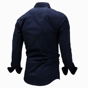 Detailed back view of navy blue long sleeve shirt with shoulder yoke stitching details