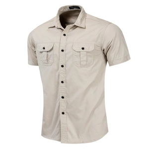 Detail of military-style short sleeve cotton shirt with buttoned flap chest pockets