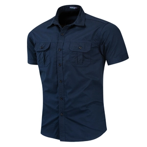 Detailed view of navy short-sleeve cargo shirt showing double buttoned chest pockets