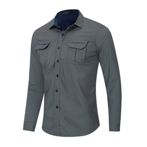Detail of grey military style shirt showing buttoned flap pockets and collar lining