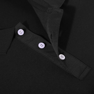 Macro shot of black pique polo shirt collar with three contrasting white buttons