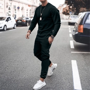 Men's minimalist black long sleeve tracksuit set with crewneck top and jogger pants