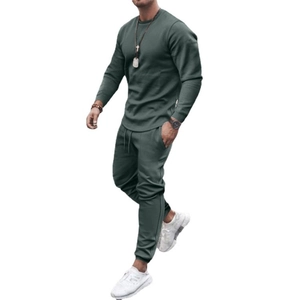 Men's casual long sleeve sweatshirt and drawstring joggers set in dark green knit fabric