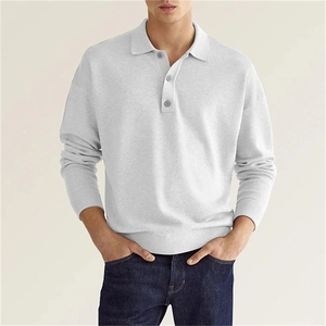 Close-up of three-button placket and collar detail on light gray knit long sleeve polo