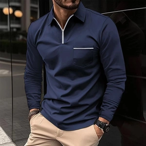 Detail of navy blue long sleeve polo shirt featuring silver zipper and chest pocket