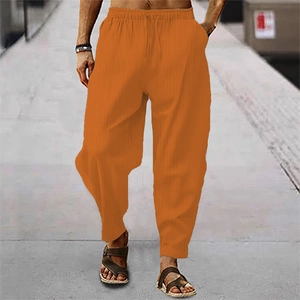 Detail der orange gestreiften Baumwoll-Leinen-Herrenhose mit Kordelzug und Gummibund