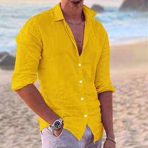 Detail of ginger cotton linen shirt showing fabric texture, buttons and sleeve style