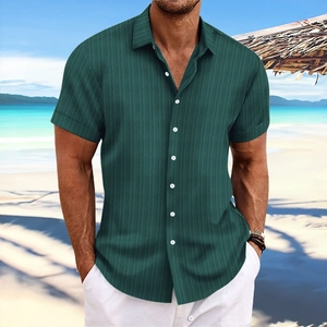 Close-up of dark green men's striped shirt fabric with white buttons and collar details