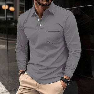 Detailed view of gray long-sleeve polo shirt featuring a buttoned collar and chest pocket
