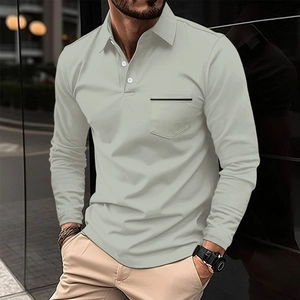 Detail of men's long sleeve polo shirt featuring buttoned collar and chest pocket