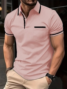 Men's slim fit pink polo shirt with black contrast trim on collar and pocket