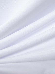 Detailed view of breathable white honeycomb mesh fabric on a high-quality athletic polo shirt
