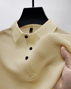 Men's beige waffle knit polo shirt with breathable mesh texture and stretchy fabric