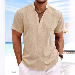 Men's khaki linen short sleeve Henley shirt with vertical texture on sunny beach
