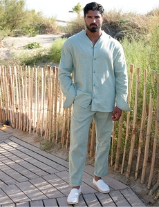 Relaxed men's linen set featuring a long-sleeve mint green shirt and matching casual trousers