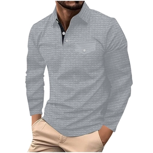 Men's grey long sleeve polo shirt with textured waffle pattern and buttoned chest pocket