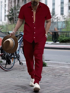 Burgundy short sleeve shirt and trousers set with vertical texture on city street