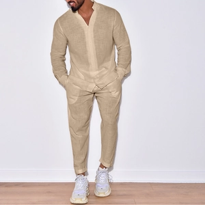 Detail view of men's khaki linen shirt and pants set with standing collar and casual fit