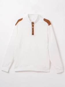 Detail of white Henley shirt with brown shoulder patches and three-button neckline