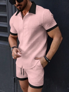 Detailed texture of men's summer short sleeve shirt with black collar contrast