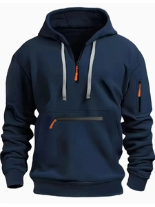 Detail of navy hoodie showing chest zipper pocket and vibrant orange puller accents