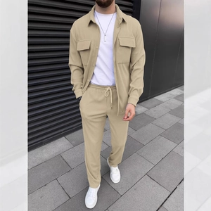 Detail of men's beige corduroy two-piece set with long-sleeve shirt and drawstring pants